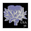 Postage-stamp-style artwork with a lavender and silver botanical bloom on black, a white scalloped border, and USA 5¢ lettering.